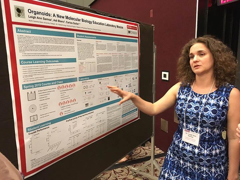 Dr. Leigh Ann Samsa presenting a poster on the Organoids module. 