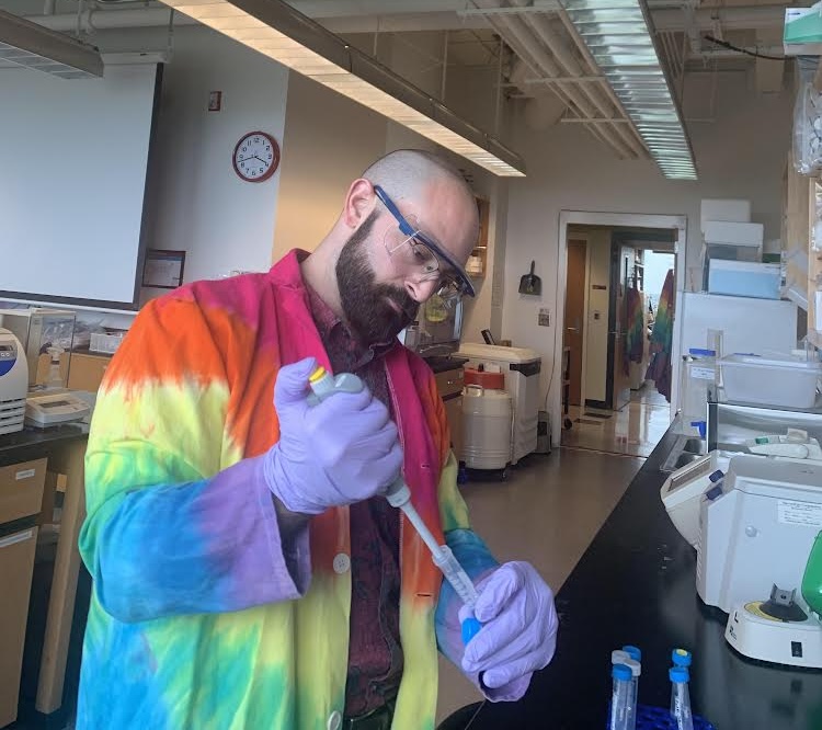 Dr. Huggins working in the lab